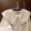 Sweater flores bordadas