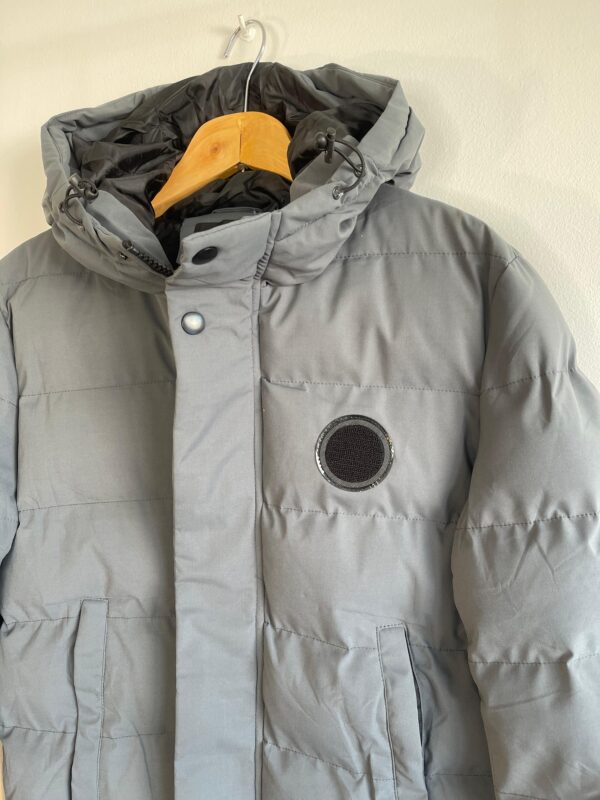 c5ef6939-dac9-44af-8cb6-6000c198f8ae Campera de abrigo