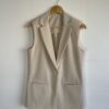 Imagen de WhatsApp 2025-10-11 a las 17.09.37_98d22f61 beige 4 Blazer sin mangas