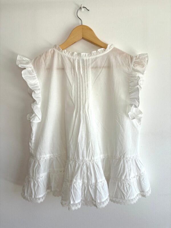 WhatsApp Image 2025-11-25 at 14.19.07 6 Blusa sin mangas volados