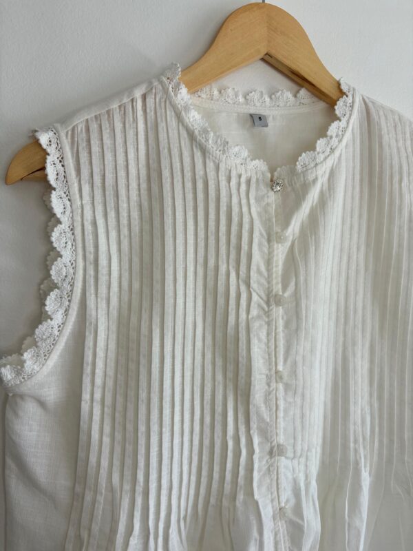 Blusa sin mangas puntilla tableada