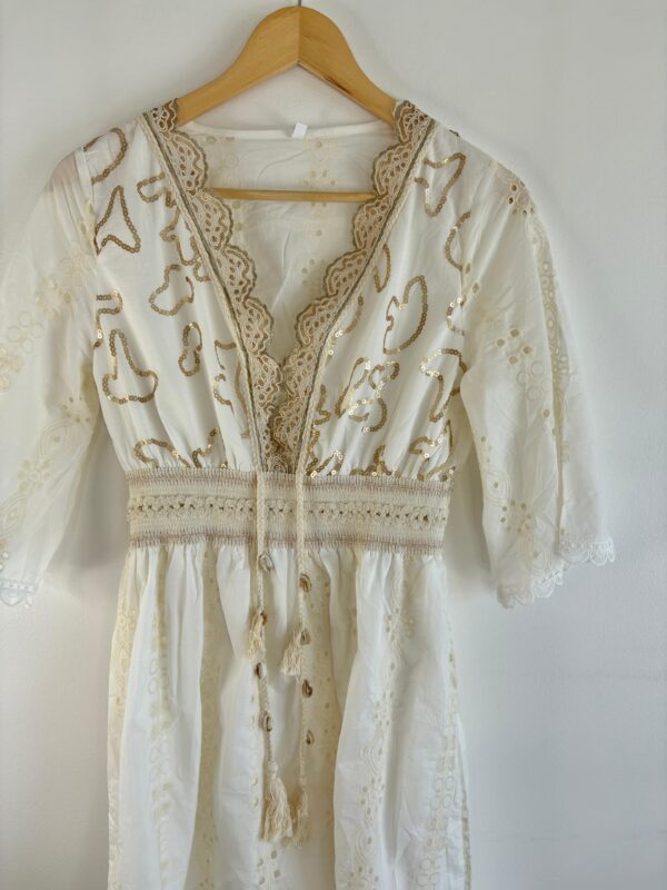 Vestido corto broderie lentejuelas