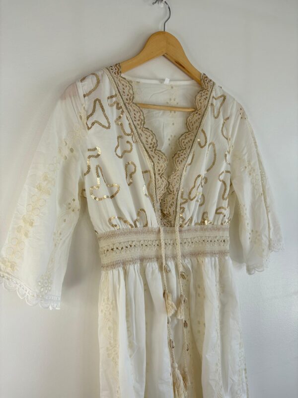 Vestido corto broderie lentejuelas