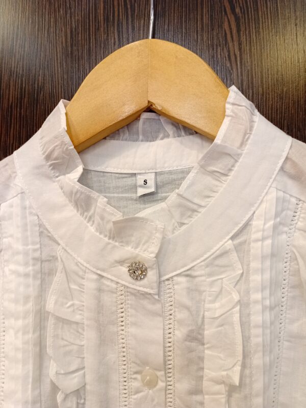 20260310_121010 Blusa volados manga globo