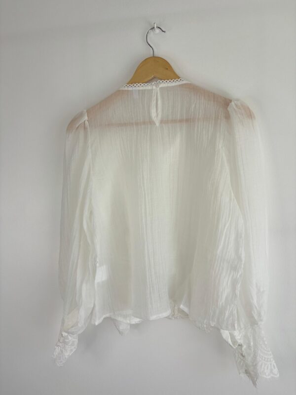 WhatsApp Image 2026-03-09 at 17.34.09 7 Blusa tul volados y puntillas