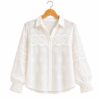 Camisa flores bordadas
