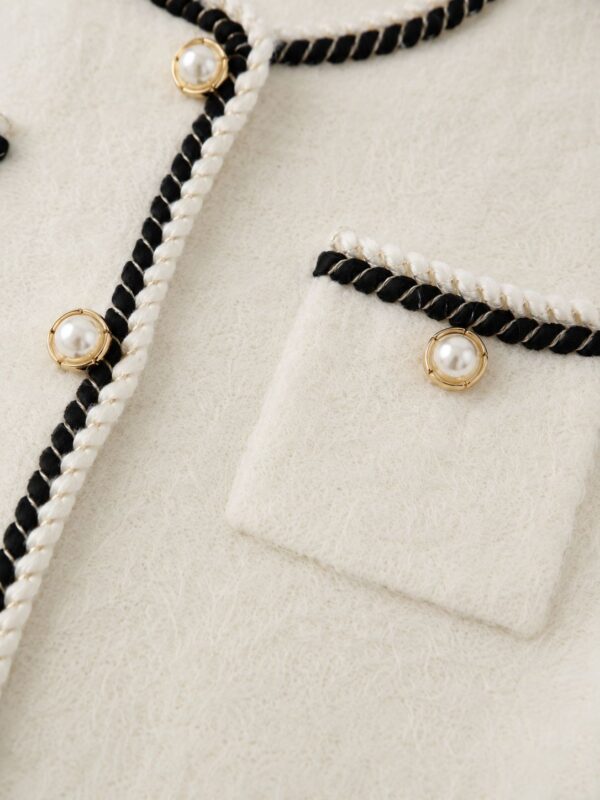 WhatsApp Image 2026-05-30 at 13.35.27 4 Saco ribetes en negro