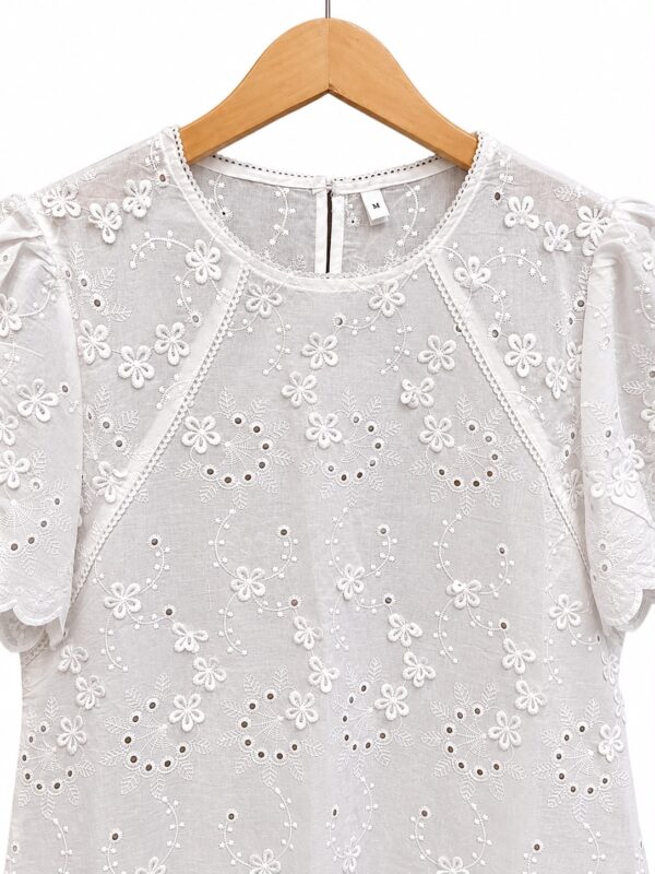 Blusa aplique flores